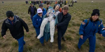 NASA astronaut Donald Pettit being carried to a medical tent shortly after landing in a Soyuz MS-26 spacecraft with Russian astronauts Alexey Ovchinin and Ivan Vagner near Dzhezkazgan, Kazakhstan, on April 20, 2025